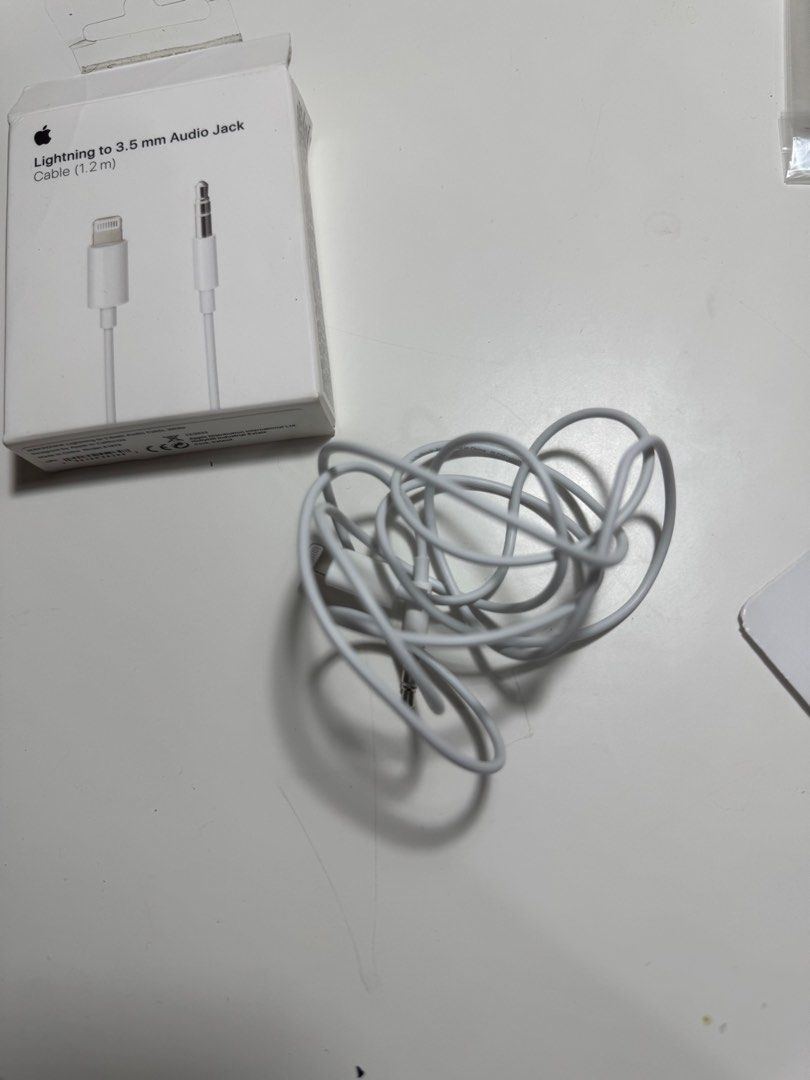 Apple Lightning to 3.5 mm Audio Jack (Category: Chargers & Cables) located in Manila. Submitted by miffybuyandsells (Listing ID 1425797883, Image 2). Description: - only used once in the plane - got this at an airport (forgot where sorry) - shipping to be shouldered by the buyer - MOP: gcash or bank transfer.