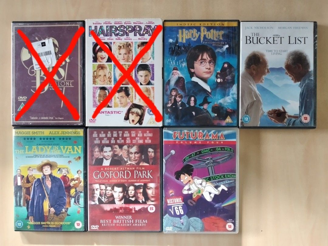 Assorted DVD Movie Collection (Category: CDs & DVDs) located in Baguio. Submitted by tipiditis (Listing ID 1425670555, Image 3). Description: Collection of various DVDs including movies like "Superbad", "Love Actually", "De-Lovely", "The Holiday", "The Best Exotic Marigold Hotel", "Finding Forrester", "Boardwalk Empire", "Simon Schama's Power of Art", "Harry Potter", "The Bucket List", "The Lady in the Van", "Gosford Park", "Futurama", "Horrible 