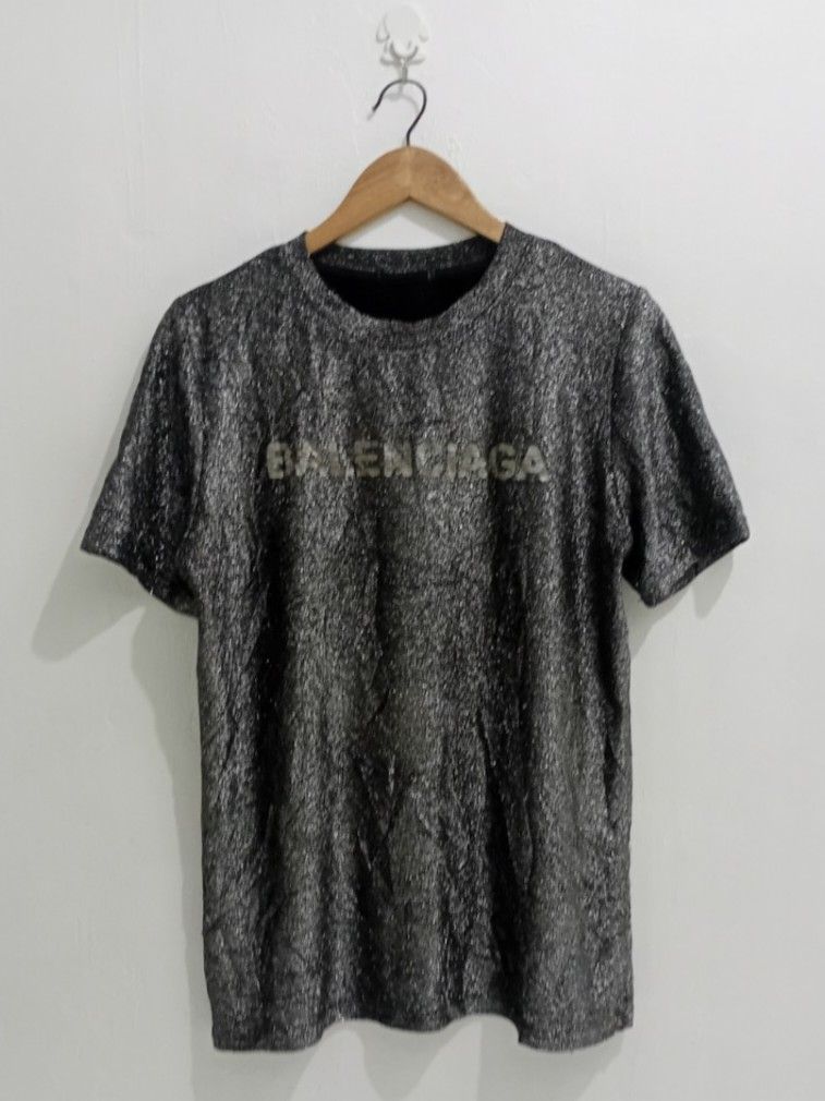 Balenciaga Metallic thread Logo T-shirt (Category: Luxury Apparel) located in Manila. Submitted by eriiicaspage (Listing ID 1423986911, Image 3). Description: PREOWNED Ligbtly Used B@LENCIAGA METALLIC THREAD TSHIRT LARGE -XL Stretch Cut tags( NGA ) Good Condition 9/10.