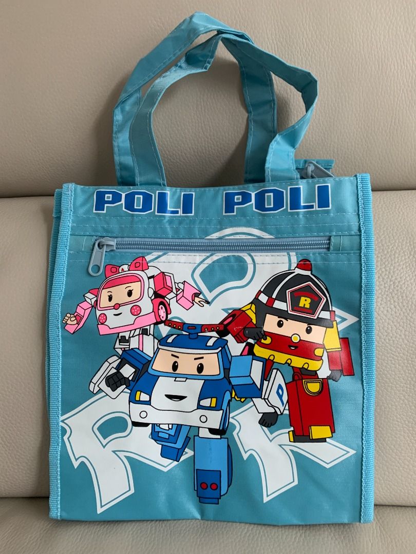 Brand New Robocar Poli Rescue Team Kid's Hand Bag Shopping Tote Bag Lunch Bag Outings Carrying Bag (Category: Girl's Apparel) located in Vancouver. Submitted by eddymong2355175 (Listing ID 1425815727, Image 1). Description: - Brand New, never used - With Robocar Poli Rescue Team main characters: they are Poli the police car, Amber the ambulance and Roy the fire truck - size: 25 (L) x 13 (W) x 26 (H) cm - from smoke and pet free home - pick up in 