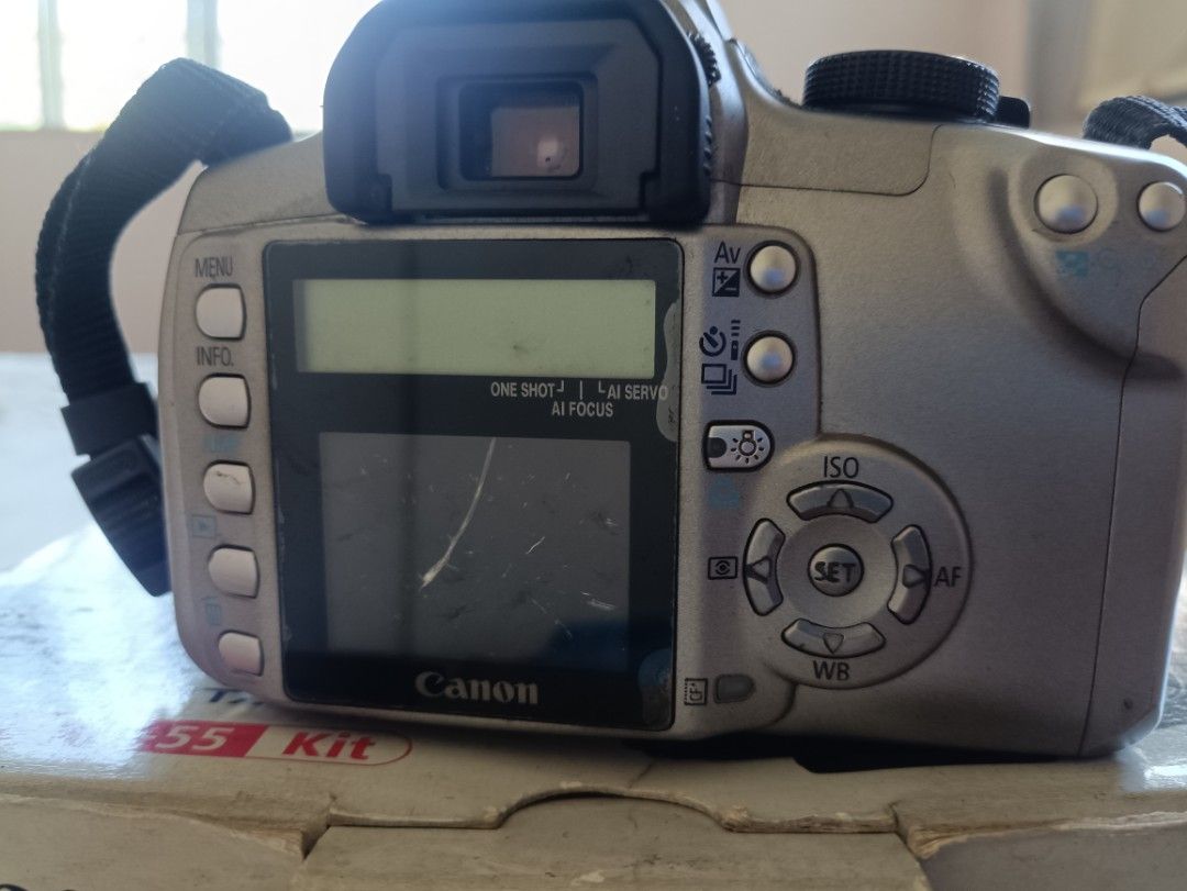 Canon EOS 350D Digital Camera Kit (Category: Cameras) located in Manila. Submitted by euphoria.soaps (Listing ID 1425691054, Image 3). Description: Working Camera but crack LCD doesn't affect viewfinder. comes with; -class A battery -charger -av camera cable -original cd installer - canon camera bag - box -new cr 2016.