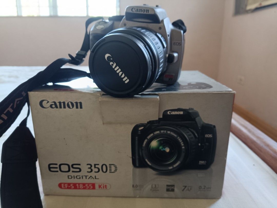 Canon EOS 350D Digital Camera Kit (Category: Cameras) located in Manila. Submitted by euphoria.soaps (Listing ID 1425691054, Image 2). Description: Working Camera but crack LCD doesn't affect viewfinder. comes with; -class A battery -charger -av camera cable -original cd installer - canon camera bag - box -new cr 2016.