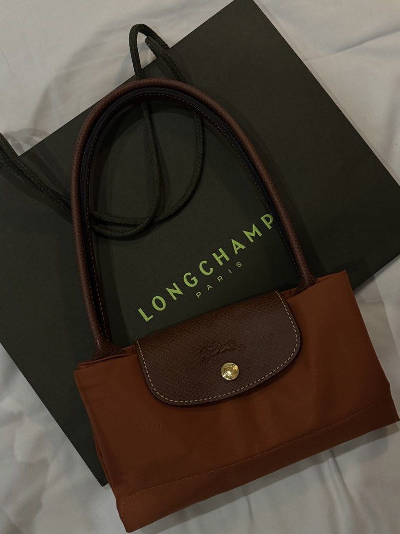 Cognac Longchamp Le Pliage Large Totebag (Category: Luxury Bags & Wallets) located in Manila. Submitted by _girlfinds (Listing ID 1425664781, Image 1). Description: 👜 LONGCHAMP LE PLIAGE – JAPAN SOURCED, YES TO RUSH SHIPPING! Elevate your daily style with this classic and functional Longchamp tote. 📍 Sourced directly from Japan – self authentication with the provided photos, premium quality. ❗ Please Read Before Ordering: 📸 All available photo