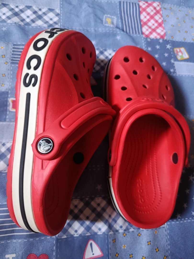 Crocs Bayaband Classic Clog Red (Category: Slippers & Slides) located in Bangued. Submitted by lenc79928 (Listing ID 1425658839, Image 3). Description: * Ethylene Vinyl Acetate Material * Slip On * Unisex BayaBand Clogs * Size: Men's - US 5 Womens-US 7 * Used twice only * No inclusion .