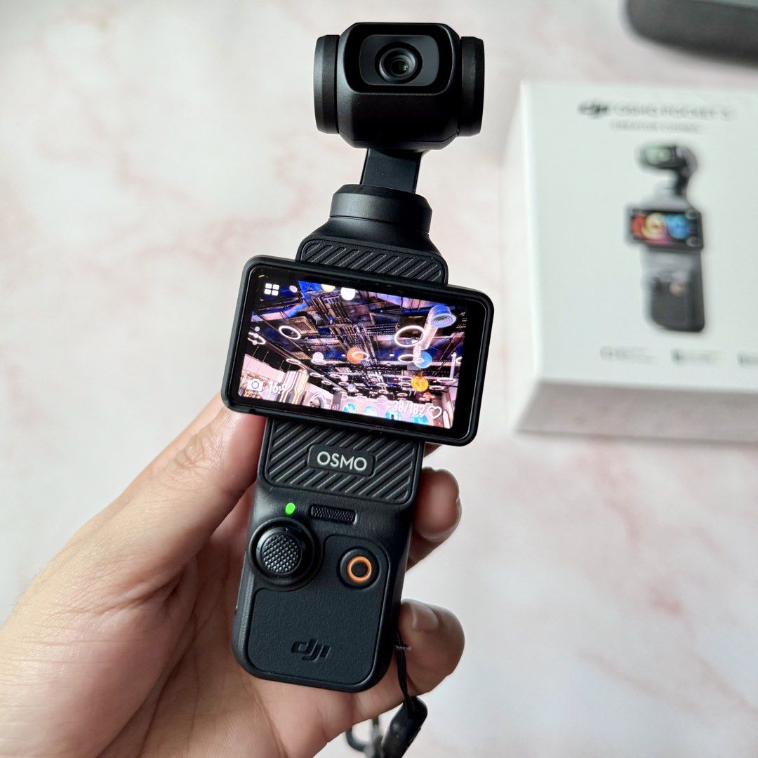 DJI Osmo Pocket 3 Creator Combo (Category: Cameras) located in Pasig City. Submitted by caelc (Listing ID 1425739193, Image 3). Description: DJI Osmo Pocket 3 Creator Combo With complete accessories (original packaging) * Protective cover * Wide-Angle Lens * Mic 2 Transmitter * Mic 2 Clip Magnet * Mic 2 Windscreen * Handle with 1/4” Thread * Battery Handle * Mini Tripod * Type-C PD Cable * Carrying Bag * Wrist Strap With box, manuals & ecobag Wit
