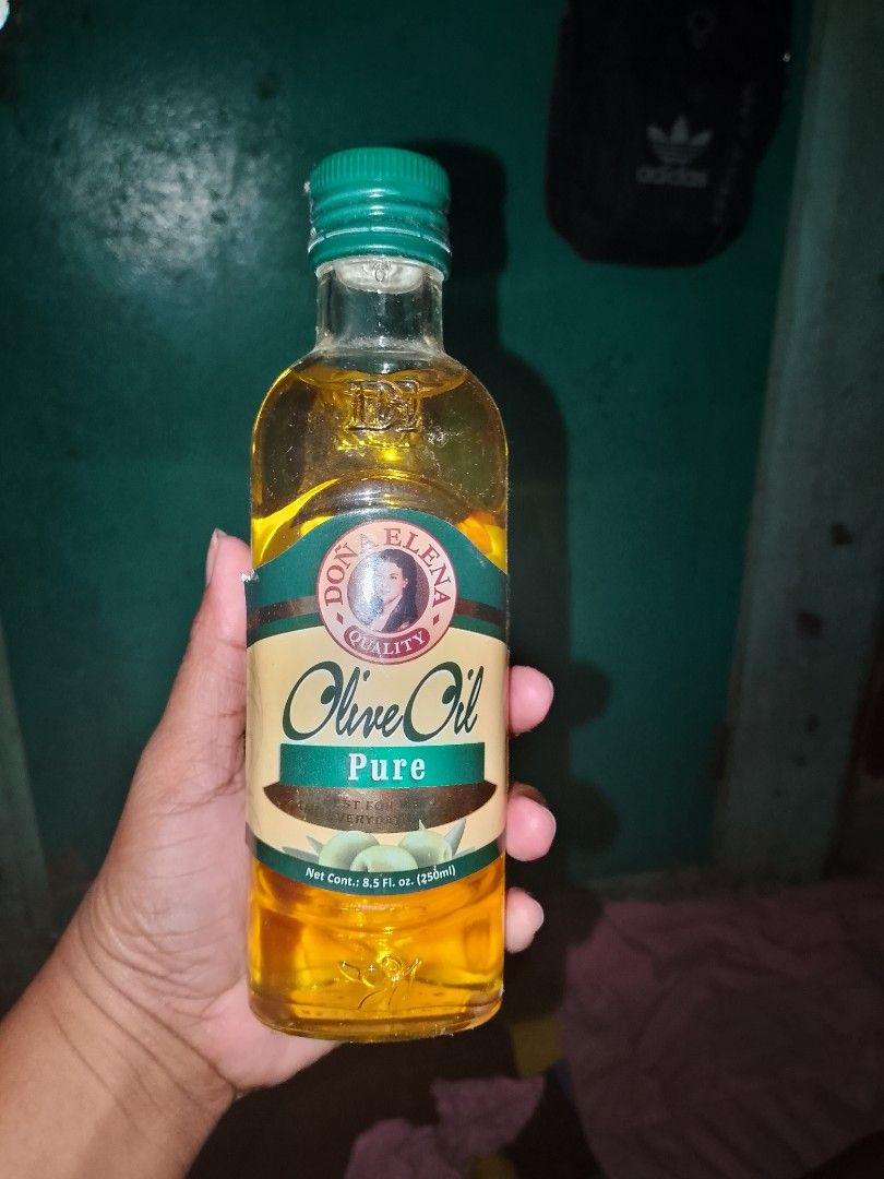 Dona Elena Pure Olive Oil (Category: Beverages) located in Quezon City. Submitted by memonse (Listing ID 1425653407, Image 1). Description: bago pa po..never been used.