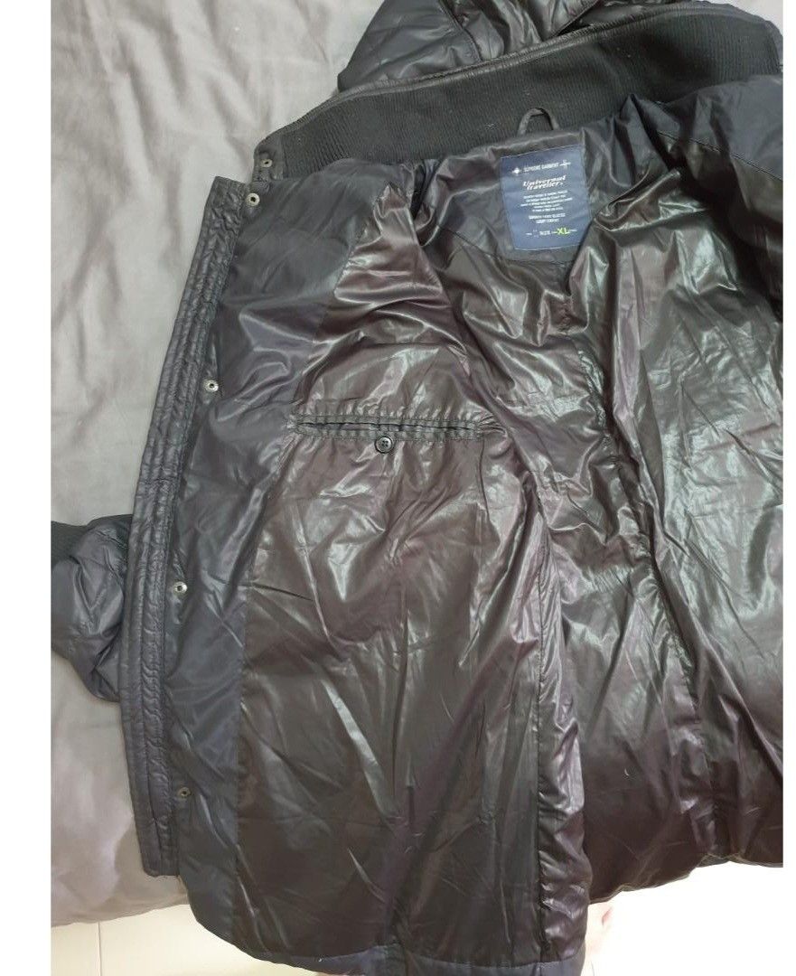 DOWN JACKET (Category: Coats, Jackets and Outerwear) located in Singapore. Submitted by koh1993 (Listing ID 1425795211, Image 5). Description: Fitted down jacket with exposed front zipper. 2 internal safety pockets for securing valuables and a detachable cap. Wind and water resistant on shell fabric. Dimension - see last photograph. All measurement +-1cm Collection at hougang mrt or 530852.