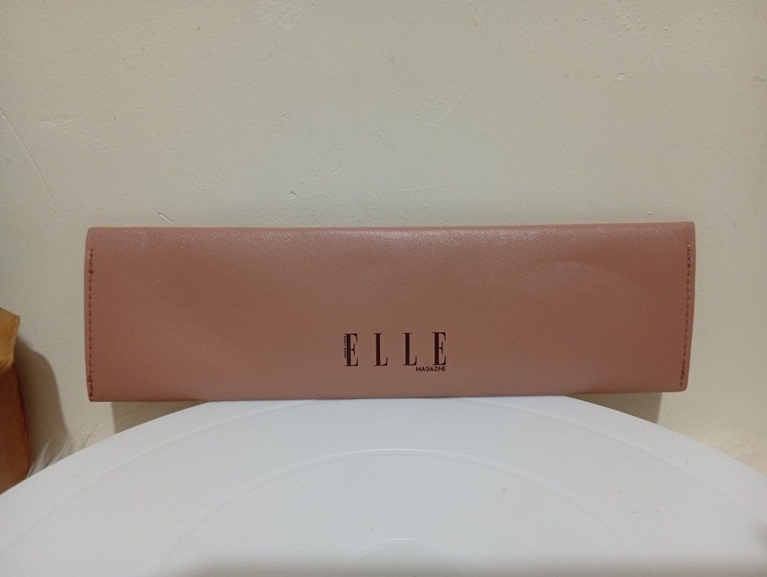ELLE™️ PINKISH BROWN TROUSSE (Category: Makeup) located in Baguio. Submitted by Zagada (Listing ID 1425654926, Image 1). Description: ELLE™️ PINKISH BROWN TROUSSE Long flat soft leather case/pencil case/make-up brush pouch etc. Size 10.25" x 3" Preloved but in a slightly used very good condition No flaw, no damage Kept in a smoke free environment Location- Baguio City Ship Nationwide via J&T Courier 🫶🫰🤍🥰.
