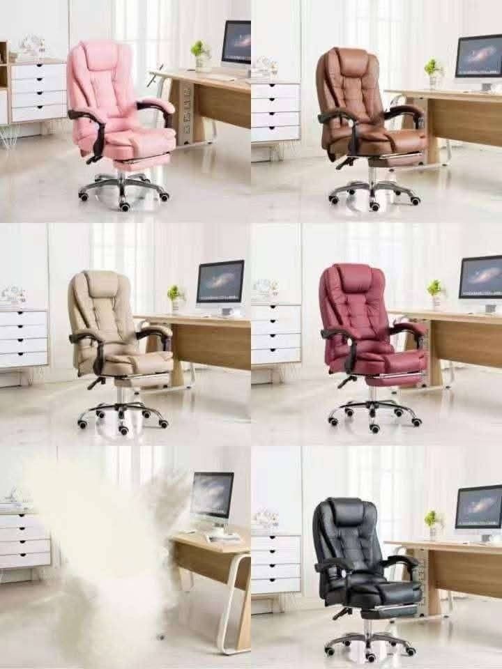 Ergonomic Office Chair with Footrest (Category: Office Furniture & Fixtures) located in Manila. Submitted by yzcartph (Listing ID 1425821616, Image 1). Description: Comfortable ergonomic office chair with a built-in footrest. Features a high back for support and armrests. Available in multiple colors: pink, brown, beige, red, and black. The chair has a swivel base with wheels for easy movement. Perfect for long hours of work or study..