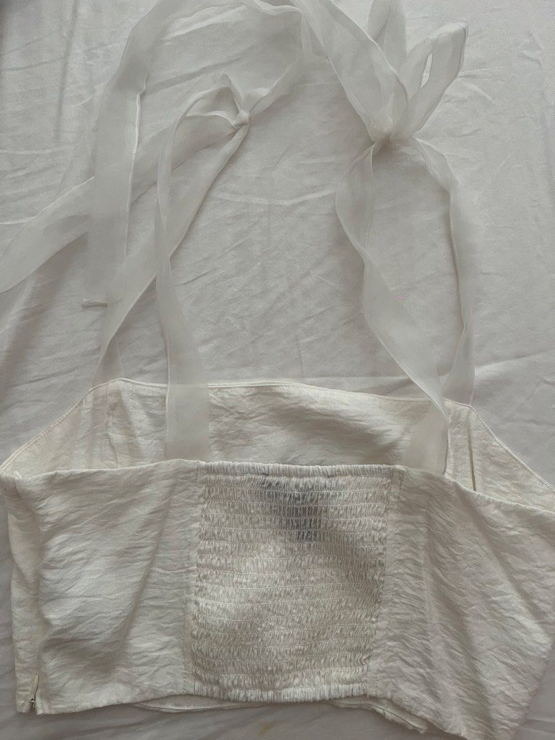 Forever 21 White Ribbon Cropped Top (Category: Sleeveless) located in Muntinlupa City. Submitted by monicaleonor (Listing ID 1425728211, Image 2). Description: - no when worn - top is made of silky material, straps are made of tulle .