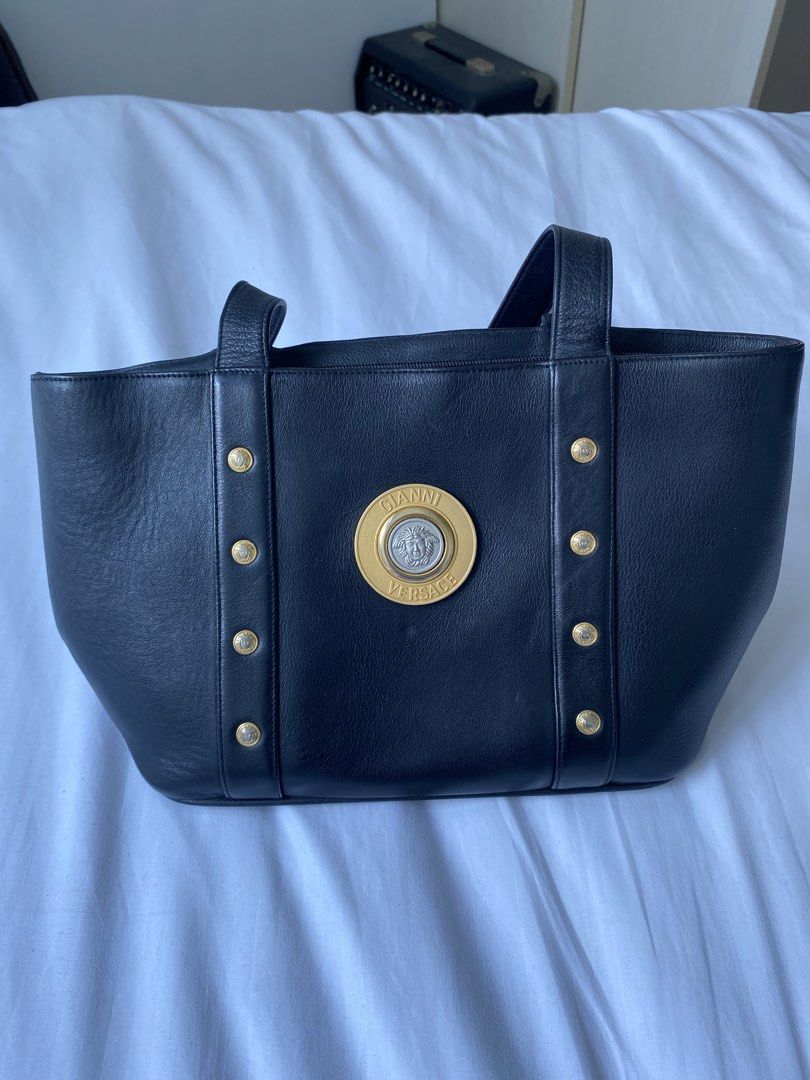 Gianni Versace Black Leather Tote Bag (Category: Luxury Bags & Wallets) located in Quezon City. Submitted by taraoffthewall (Listing ID 1425677040, Image 2). Description: Very good condition. Price negotiable. From my grandmother’s collection bought around the 90’s..