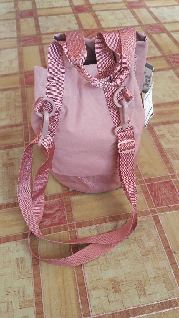 Gregory Ladybird Way Bucket Backpack (Category: Backpacks) located in General Santos City (Dadiangas). Submitted by yawords (Listing ID 1425691532, Image 2). Description: Gregory Ladybird Way Bucket backpack in a lovely pink color. It features a drawstring closure, adjustable straps, and a small internal pocket. The bag has the Gregory logo on the front. The bag has a tag attached with details about the bag..