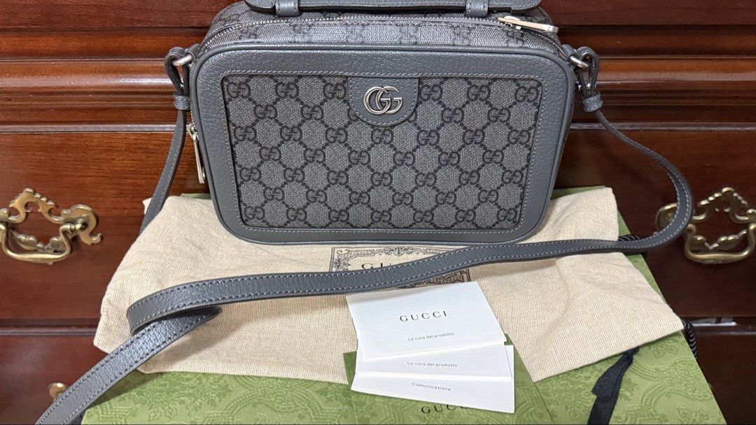 Gucci OPHIDIA SMALL CROSSBODY BAG (Category: Luxury Bags & Wallets) located in Pasig City. Submitted by mayandg (Listing ID 1425728292, Image 2). Description: Measures: 9.25″ L x 6.25″ H x 3″ D (approx) 21″ Strap Drop Variation: Grey and black Supreme Material: GG Black/Graphite Gray Supreme Monogram Hardware: Aged Silver Made in Italy Serial Number: 739392.525040 ITEM INCLUSIONS Detachable Strap, Booklets, Dust Cover, and Paper bag *In-Store pur
