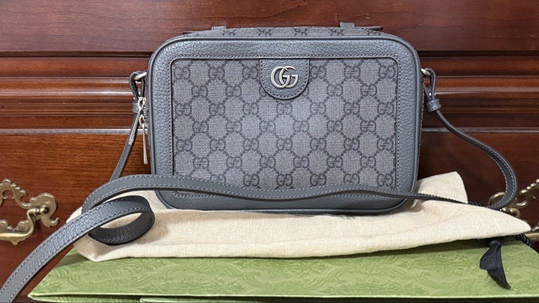 Gucci OPHIDIA SMALL CROSSBODY BAG (Category: Luxury Bags & Wallets) located in Pasig City. Submitted by mayandg (Listing ID 1425728292, Image 1). Description: Measures: 9.25″ L x 6.25″ H x 3″ D (approx) 21″ Strap Drop Variation: Grey and black Supreme Material: GG Black/Graphite Gray Supreme Monogram Hardware: Aged Silver Made in Italy Serial Number: 739392.525040 ITEM INCLUSIONS Detachable Strap, Booklets, Dust Cover, and Paper bag *In-Store pur