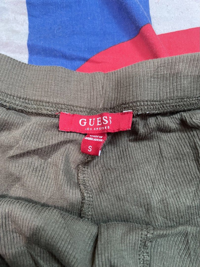 Guess Corduroy Shorts - Size S (Category: Shorts) located in San Jose del Monte. Submitted by sofiah2997 (Listing ID 1425632433, Image 3). Description: Olive green Guess shorts with a corduroy texture. Features a lace trim along the hemline and the Guess logo on the back. The shorts have an elastic waistband. Size S. Made in Bangladesh..