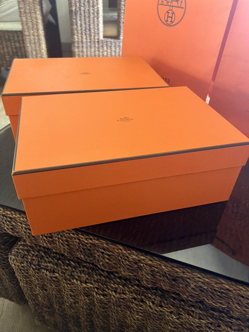 Hermes Orange Boxes and Shopping Bags (Category: Luxury Bags & Wallets) located in Manila. Submitted by murafinds26 (Listing ID 1425646045, Image 1). Description: ₱5500 per set Can fit mini bags like mini Lindy , Constance 18 etc. Authentic Hermes orange boxes and shopping bags. Includes multiple boxes and shopping bags, perfect for gifting or storage. The boxes feature the Hermes logo on the top. The shopping bags also have the Hermes logo. A gr