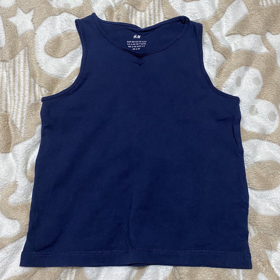 H&M Navy Blue Tank Top (Category: Babies & Kids Fashion) located in Las Pinas. Submitted by modemnl (Listing ID 1425817370, Image 1). Description: Size: 2-4Y Condition: 10/10 used once, naliitan po agad ni baby. .