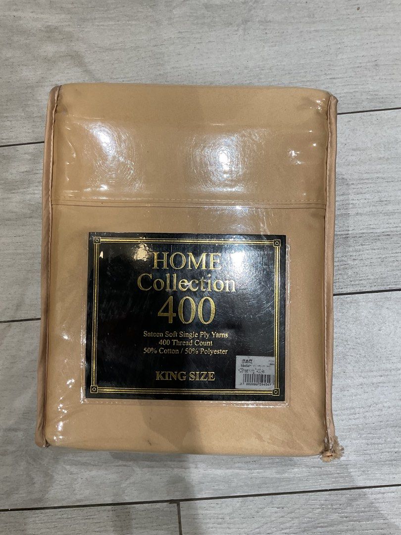 Home Collection 400 King Size Bed Sheet Set (Category: Bedding & Towels) located in Manila. Submitted by induljenceco (Listing ID 1425741137, Image 1). Description: King size bed sheet set from Home Collection. Features 400 thread count, made with sateen soft single ply yarns. The set includes one flat sheet (108" x 102"), one fitted sheet (80" x 78" x 15"), and two king pillowcases (20" x 40"). Made with 50% cotton and 50% polyester. Machine was