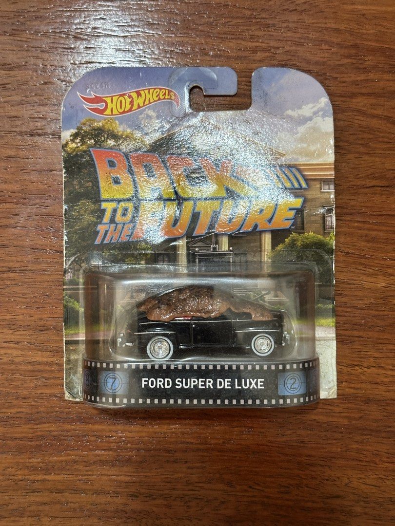 Hot Wheels Back to the Future Ford Super Deluxe (Category: Vehicle & Diecast Models) located in Quezon City. Submitted by vg.ph (Listing ID 1425696404, Image 1). Description: Hot Wheels Back to the Future – Ford Super De Luxe (2014) For sale: Hot Wheels collectible from the movie Back to the Future. Model: Ford Super De Luxe with manure detail – a fun scene reference from the film. • Brand new, still sealed in blister • Card has creases and wear 