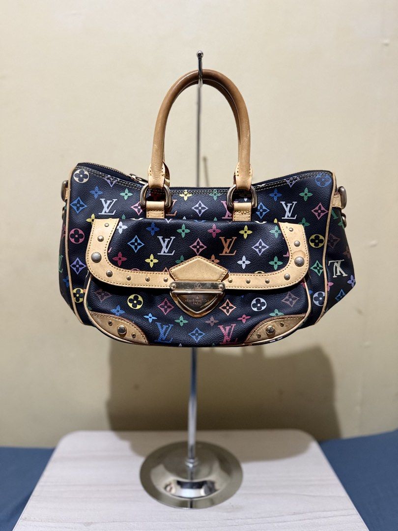 LOUIS VUITTON Black Monogram Multicolore Rita Bag (Category: Luxury Bags & Wallets) located in Cagayan de Oro. Submitted by twice.but.nice.blackmarket (Listing ID 1425634102, Image 1). Description: - LOUIS VUITTON Rita Bag - Black Monogram Multicolore design - Shoulder bag style - Good overall condition - Features the iconic LV monogram pattern - Leather handles and accents - A stylish and functional bag - And Perfect color rate.