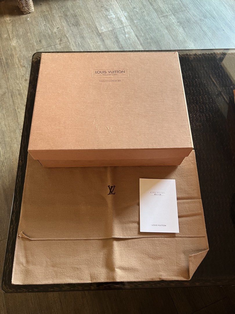 Louis Vuitton Box with Dust Bag (Category: Luxury Bags & Wallets) located in Manila. Submitted by murafinds26 (Listing ID 1425820909, Image 1). Description: Authentic Louis Vuitton box with dust bag and care booklet. The box features the Louis Vuitton logo and branding. The dust bag also has the Louis Vuitton logo. Includes the original box and care booklet. Perfect for storing your luxury items..
