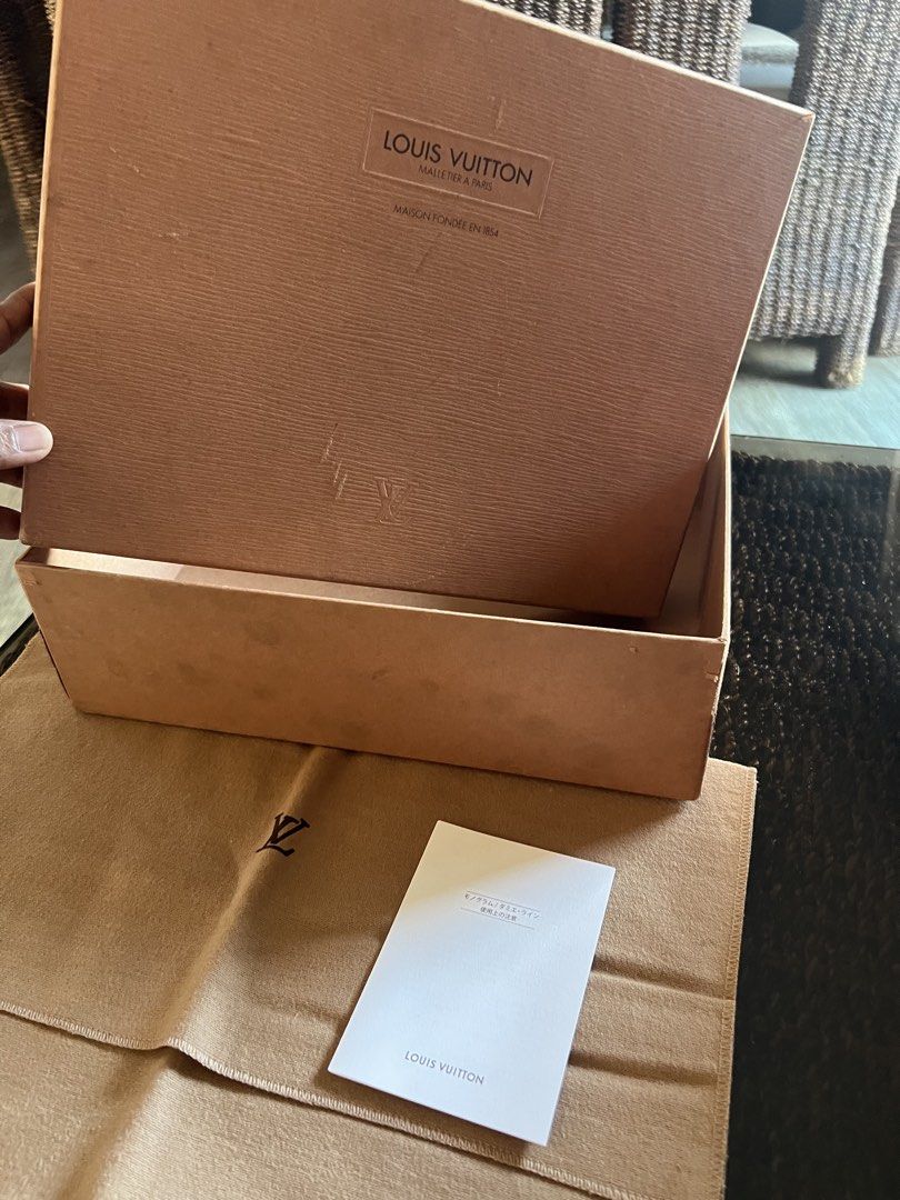 Louis Vuitton Box with Dust Bag (Category: Luxury Bags & Wallets) located in Manila. Submitted by murafinds26 (Listing ID 1425820909, Image 3). Description: Authentic Louis Vuitton box with dust bag and care booklet. The box features the Louis Vuitton logo and branding. The dust bag also has the Louis Vuitton logo. Includes the original box and care booklet. Perfect for storing your luxury items..