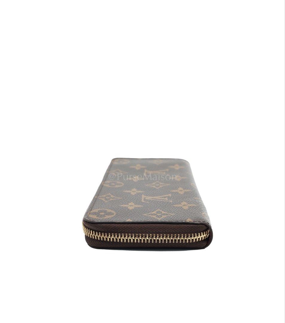 Louis Vuitton Clemence in Monogram Canvas Zippy Long Wallet (Microchip) (Category: Luxury Bags & Wallets) located in Taguig. Submitted by pursemaison (Listing ID 1425727334, Image 3). Description: Louis Vuitton Clemence in Monogram Canvas Zippy Long Wallet (Microchip) Price: Php 31,000.00 Condition: Good (8/10) Exterior: Normal signs of usage, normal rub marks on cornes due to usage, signs of usage on zipper pull Interior: Normal signs of usage, 