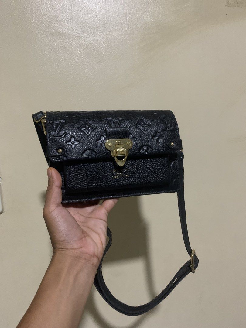 Louis Vuitton Vavin Chain Wallet in Noir Monogram Empreinte leather (Category: Luxury Bags & Wallets) located in Dipolog. Submitted by knightorious_thrift (Listing ID 1425708540, Image 1). Description: Excellent condition Change sling Pwede gawing wallet.