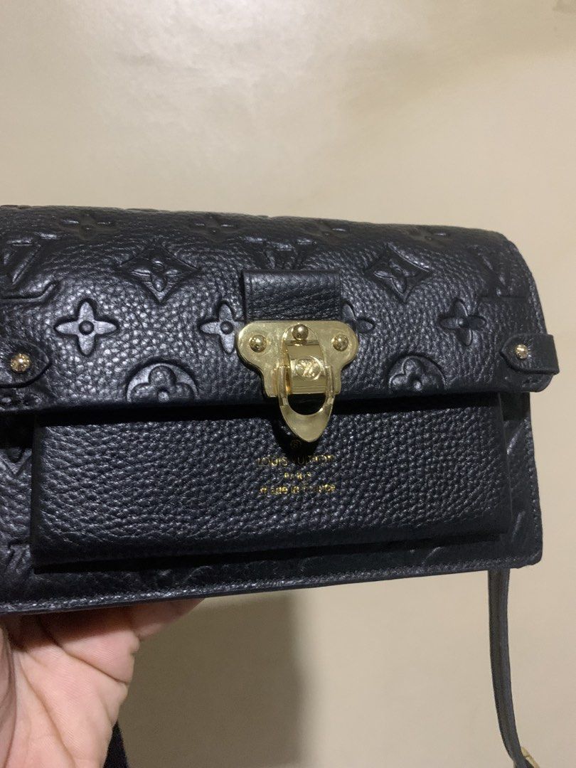 Louis Vuitton Vavin Chain Wallet in Noir Monogram Empreinte leather (Category: Luxury Bags & Wallets) located in Dipolog. Submitted by knightorious_thrift (Listing ID 1425708540, Image 3). Description: Excellent condition Change sling Pwede gawing wallet.