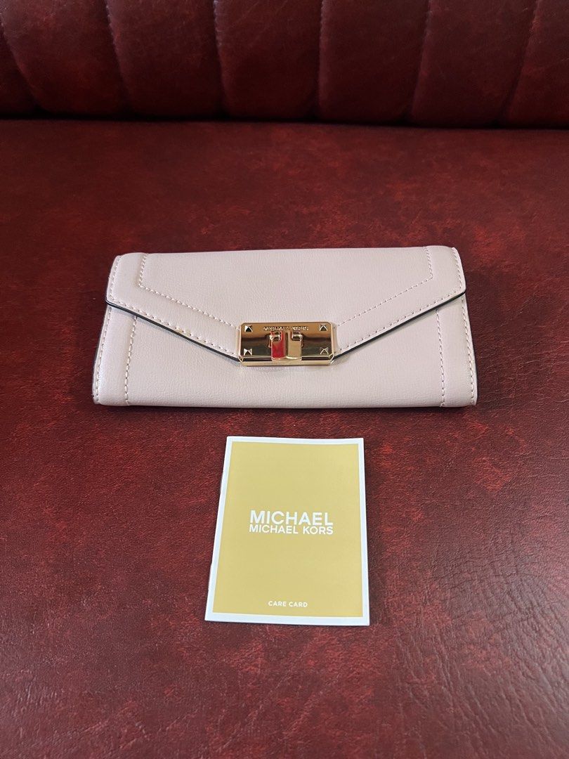 Michael Kors Kinsley Large Carryall Wallet (Category: Wallets & Card holders) located in Cavite. Submitted by rov26 (Listing ID 1425654447, Image 3). Description: Selling this Michael Kors Kinsley Large Carryall Flap Leather Wallet. Used only once so it’s still in like new condition. It’s been kept in storage and comes with the care guide..