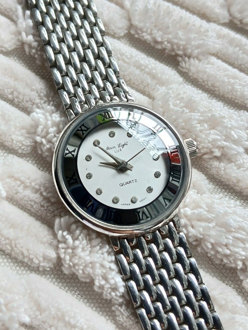 Moon Light Lux Quartz (Category: Luxury Watches) located in Tabaco. Submitted by igoys-watches (Listing ID 1425650818, Image 1). Description: Moon Light LUXQuartz ✅️Good Running Condition ✅️Gray Dial ✅️All Original ✅️Near Mint ✅️Roman Numerals Marker ✅️Newly Replaced Battery ✅️Clean Glass ✅️Adjustable strap ✅️With factory sticker on the back case ✅️Dome glass ✅️Percect for any occasions 👌 ❌️Minor stains on dial but barely visible. ❌️Minor scratc