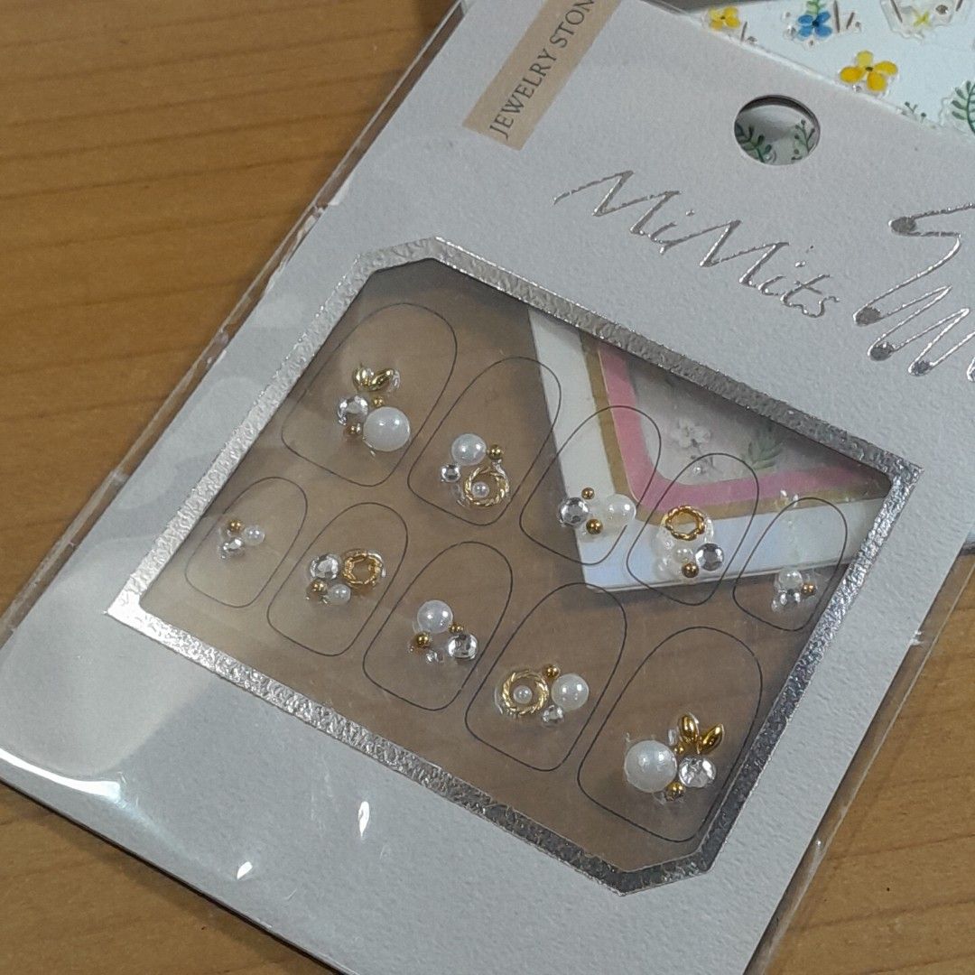 Nail Art Set (Category: Hands & Nails) located in Las Pinas. Submitted by 84vintage (Listing ID 1425655692, Image 3). Description: Nail Art Set! It includes a variety of nail art stickers from Viviana, some blingy nail jewelry, and a set of eye shadow brushes. The stickers feature lovely floral designs, perfect for adding a touch of elegance to your nails. The nail jewelry adds a touch of sparkle and sophistication. The eye shadow brushes are a b