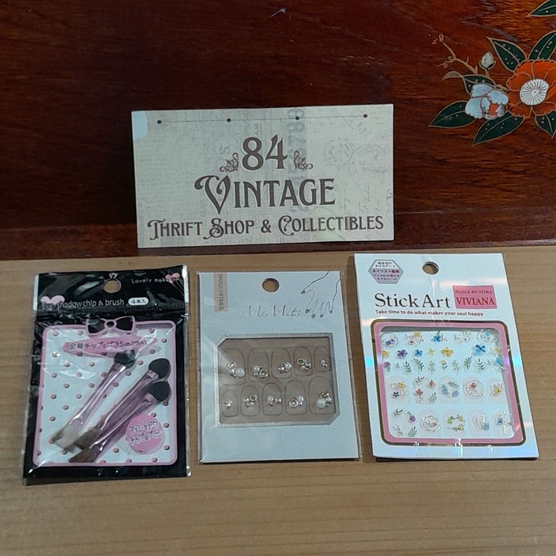 Nail Art Set (Category: Hands & Nails) located in Las Pinas. Submitted by 84vintage (Listing ID 1425655692, Image 1). Description: Nail Art Set! It includes a variety of nail art stickers from Viviana, some blingy nail jewelry, and a set of eye shadow brushes. The stickers feature lovely floral designs, perfect for adding a touch of elegance to your nails. The nail jewelry adds a touch of sparkle and sophistication. The eye shadow brushes are a b