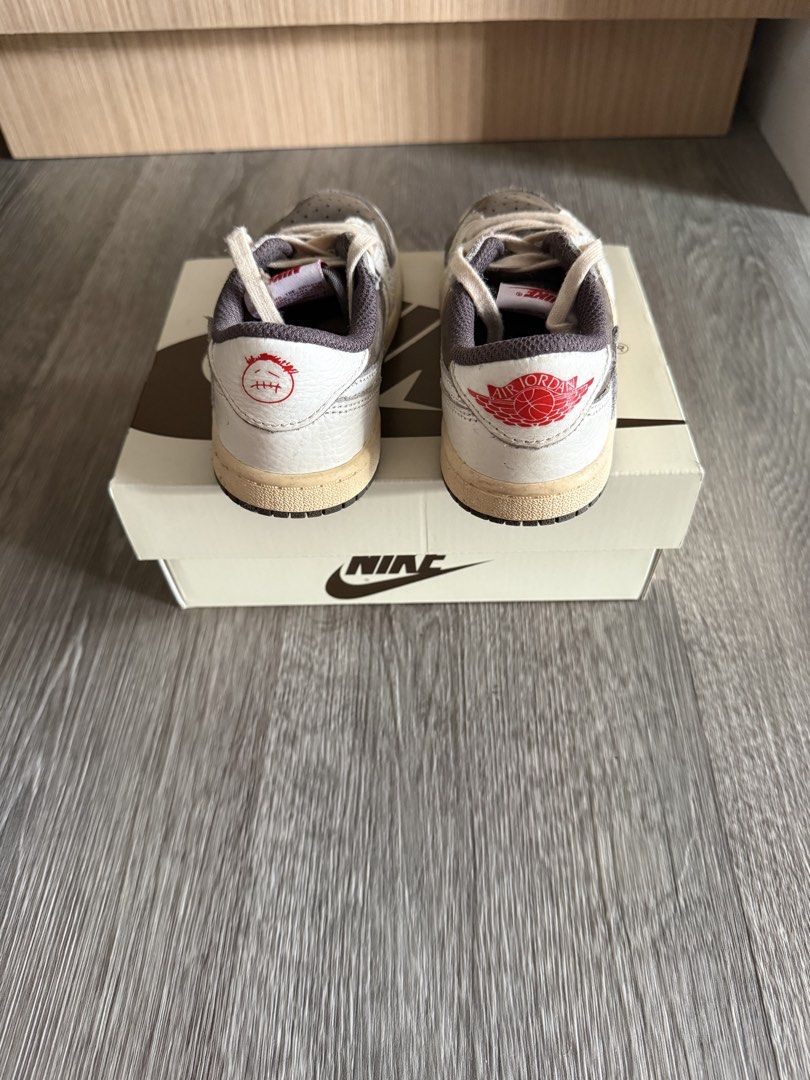 Nike Air Jordan 1 Low Travis Scott Reverse Mocha (Category: Babies & Kids Fashion) located in Quezon City. Submitted by ran.dr (Listing ID 1425642380, Image 3). Description: Travis Scott Reverse Mocha 10C 16cm 1000% Authentic Outgrown, fits 4-6 y/o First own and not a reseller 7,000.