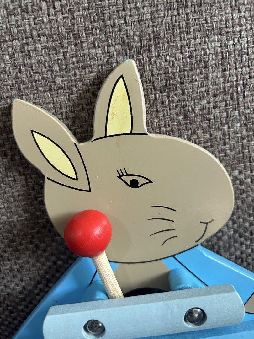 Orange Tree Toys Peter Rabbit Xylophone preloved (Category: Educational & Learning Toys) located in Marikina City. Submitted by cutesypatsy (Listing ID 1425642001, Image 3). Description: Adorable xylophone features a Peter Rabbit design. It is made by Orange Tree Toys and manufactured in China. The back of the xylophone has an egg-shaped cutout. The xylophone has blue bars and comes with a red-tipped mallet. The item is from 2019..