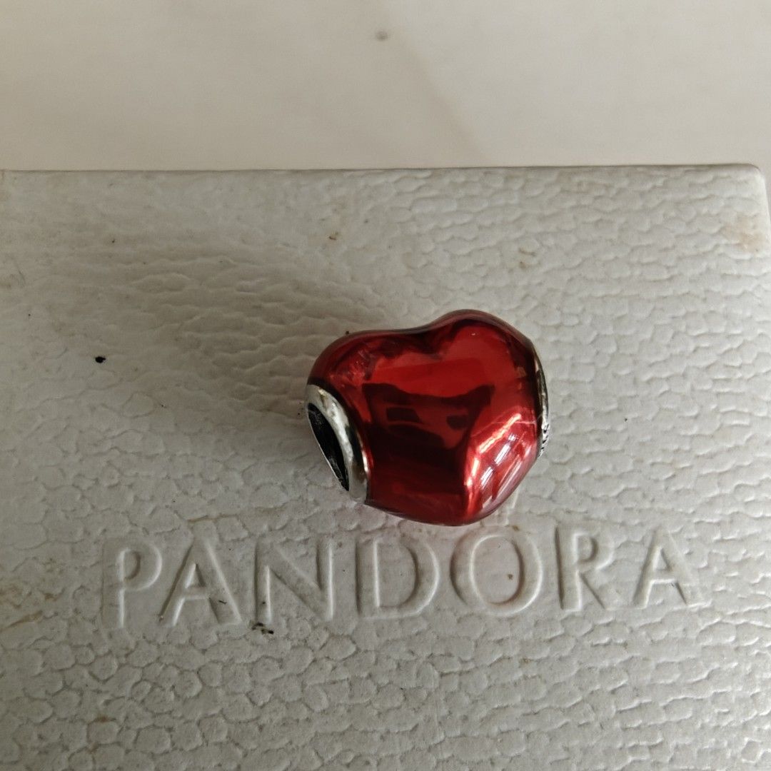Pandora metallic red heart charm (Category: Charms) located in Makati City. Submitted by ly12eb (Listing ID 1425656562, Image 1). Description: Authentic Excellent condition.