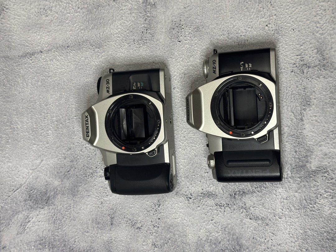 Pentax camera bundle (Category: Cameras) located in Senai. Submitted by tjy3108 (Listing ID 1425821341, Image 2). Description: One working one unknown condition. Sell as bundle.