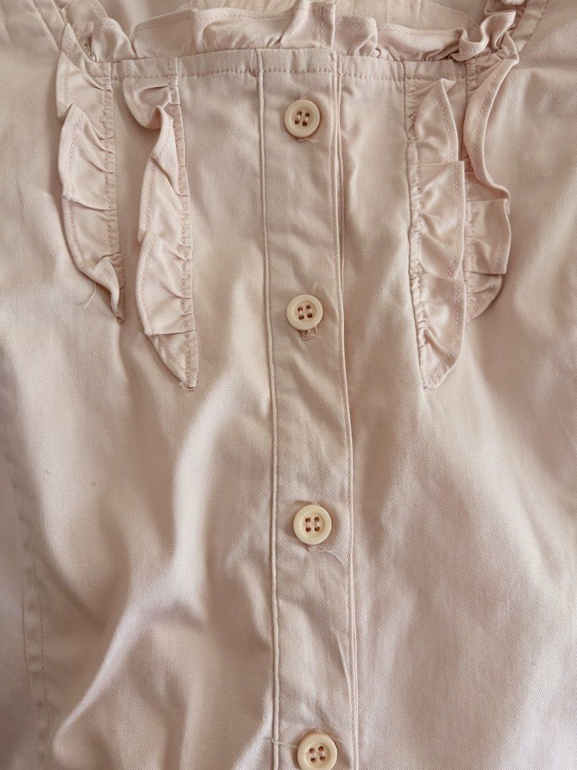 pink frilly shoujo sleeveless button up blouse (Category: Sleeveless) located in Quezon City. Submitted by legbur (Listing ID 1425675881, Image 3). Description: ‼️ NO WW size: M-L brand: N/A - 10/10 condition, no flaws - has a belt at the back to snatch the waist - material is really good quality and can pair with a lot of outfits, would keep if it were my size :< payment through gcash only! can be delivered through lalamove or j&t.
