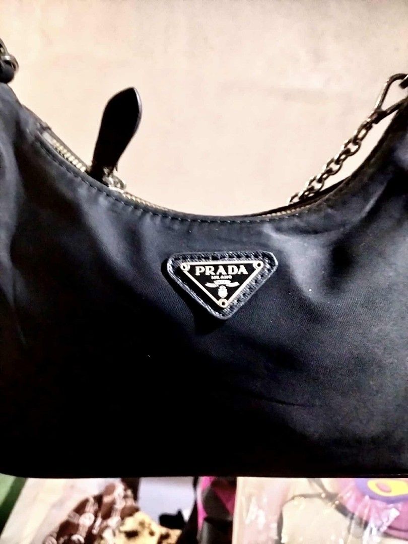 Preloved prada hobo (Category: Luxury Bags & Wallets) located in Valenzuela. Submitted by prettyjhoza_23 (Listing ID 1425761272, Image 1). Description: Hey there! Check out this awesome [prada] [mini hobo] in a sleek [Color]! The design is super stylish, perfect for everyday wear. The material feels really nice and durable. Grab it before someone else does! Used MESSAGE me.