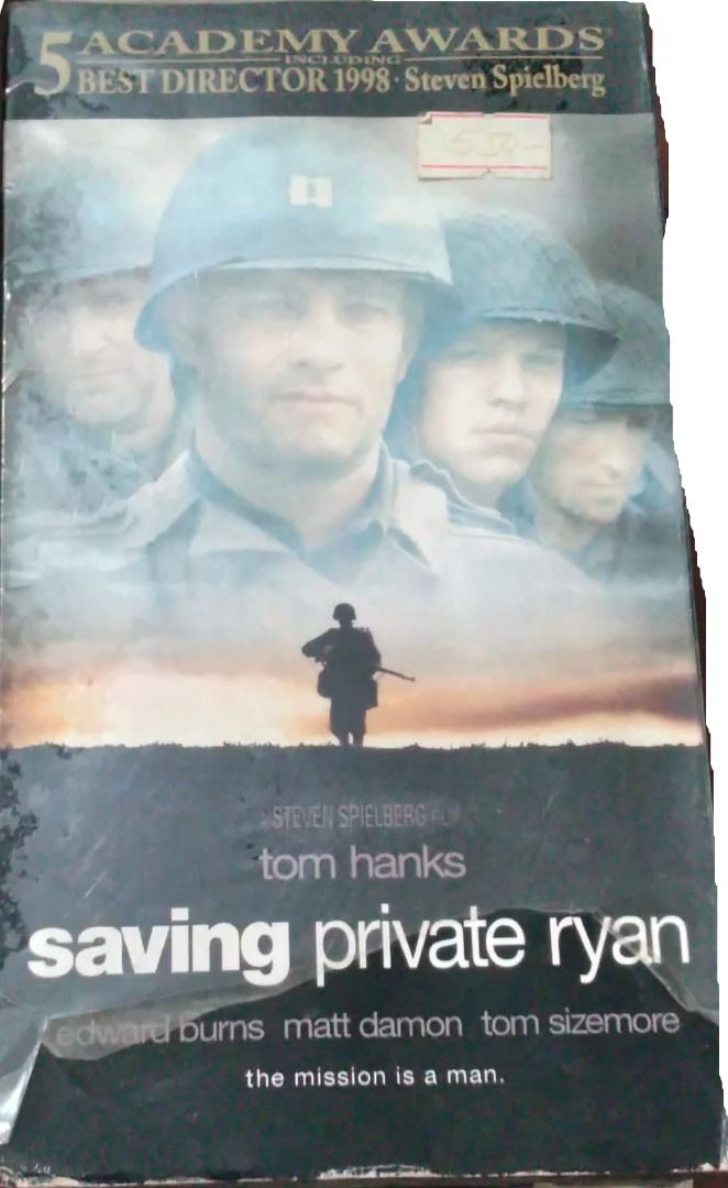 Saving Private Ryan VHS (Category: Storybooks) located in Makati City. Submitted by skyfall2020 (Listing ID 1425684664, Image 1). Description: VHS copy of the movie "Saving Private Ryan" directed by Steven Spielberg, starring Tom Hanks, Matt Damon, and Edward Burns. Features the movie title prominently on the cover. Includes the text "5 Academy Awards" and "Best Director 1998"..