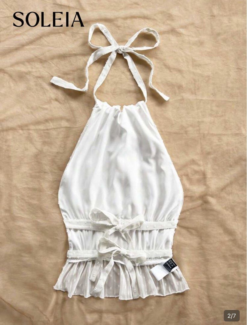 SHEIN White Summer Halter Top (Category: Sleeveless) located in Pasay City. Submitted by declutterwme01 (Listing ID 1425664588, Image 2). Description: NEVER BEEN USED RFS: Wrong Size Size: XS-S (S on tag) bought from SHEIN so same price as i bought it Loc: Taft, España MOD: GCash/Cash can do meet ups or lalamove (sf will be shouldered by the buyer) NO RETURN. message me for more infos!.