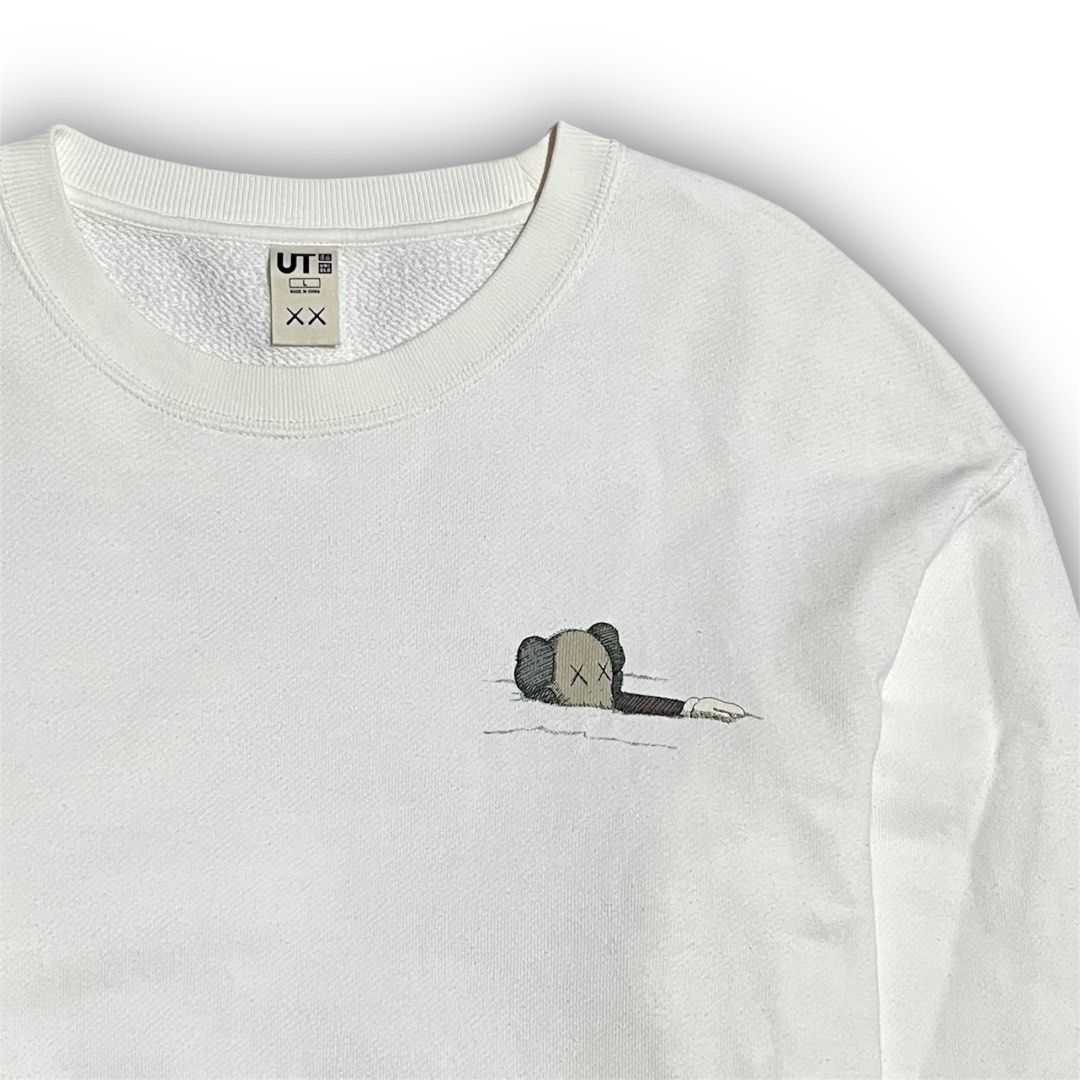 Uniqlo x Kaws Sweater (Category: Activewear) located in Davao. Submitted by lwndvo (Listing ID 1425796116, Image 3). Description: Uniqlo x Kaws Sweater Excellent Uc Dimensions: Width: 22 Length: 27 Issue/s: Stains need hard wash ( natambak sa storage ) Price: 800 + sf.