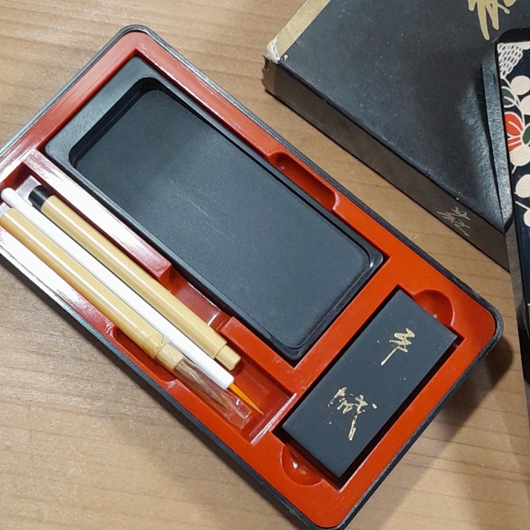 Vintage Japanese Calligraphy Set (Category: Craft Supplies & Tools) located in Las Pinas. Submitted by 84vintage (Listing ID 1425651187, Image 3). Description: Vintage Japanese calligraphy set includes a black ink stone, ink stick, and brushes. The set comes in a decorative black box with floral patterns. The box also has a separate compartment for the ink stick..