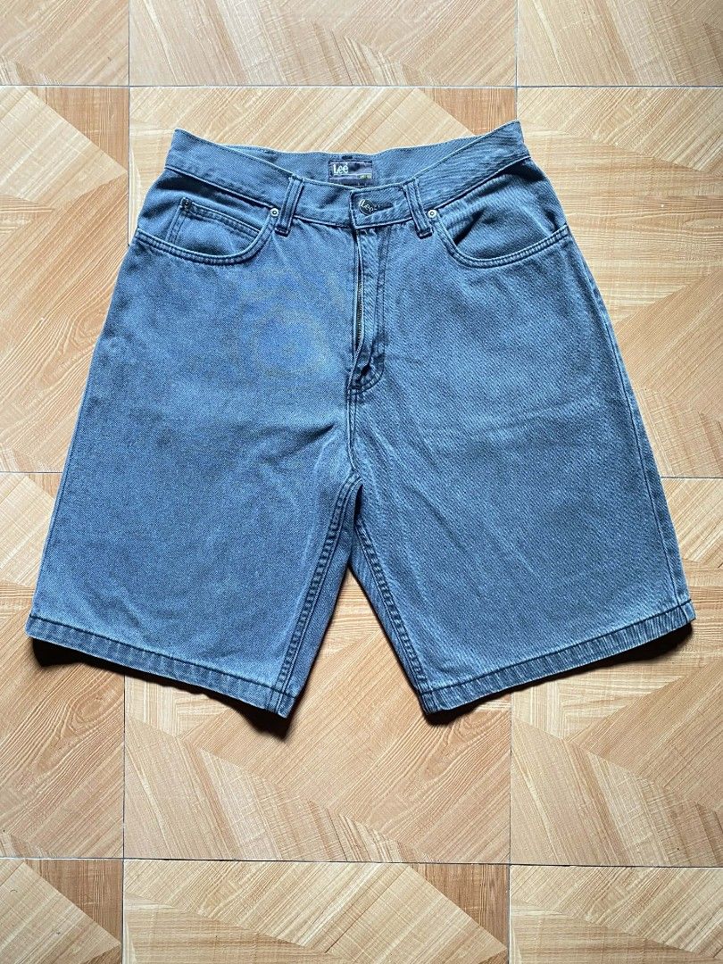 VINTAGE Lee Denim Shorts (Category: Shorts) located in Buhi. Submitted by thriftmehard (Listing ID 1425639018, Image 3). Description: Product Details Style: These are typically categorized as "baggy" or "relaxed fit" denim shorts, sometimes referred to as "skater jorts" in vintage markets. Design: They feature a classic five-pocket design with the signature Lee decorative stitching on the back pockets and a prominent leather brand patch on the wa