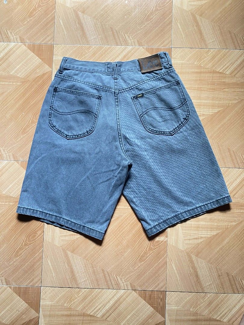 VINTAGE Lee Denim Shorts (Category: Shorts) located in Buhi. Submitted by thriftmehard (Listing ID 1425639018, Image 1). Description: Product Details Style: These are typically categorized as "baggy" or "relaxed fit" denim shorts, sometimes referred to as "skater jorts" in vintage markets. Design: They feature a classic five-pocket design with the signature Lee decorative stitching on the back pockets and a prominent leather brand patch on the wa