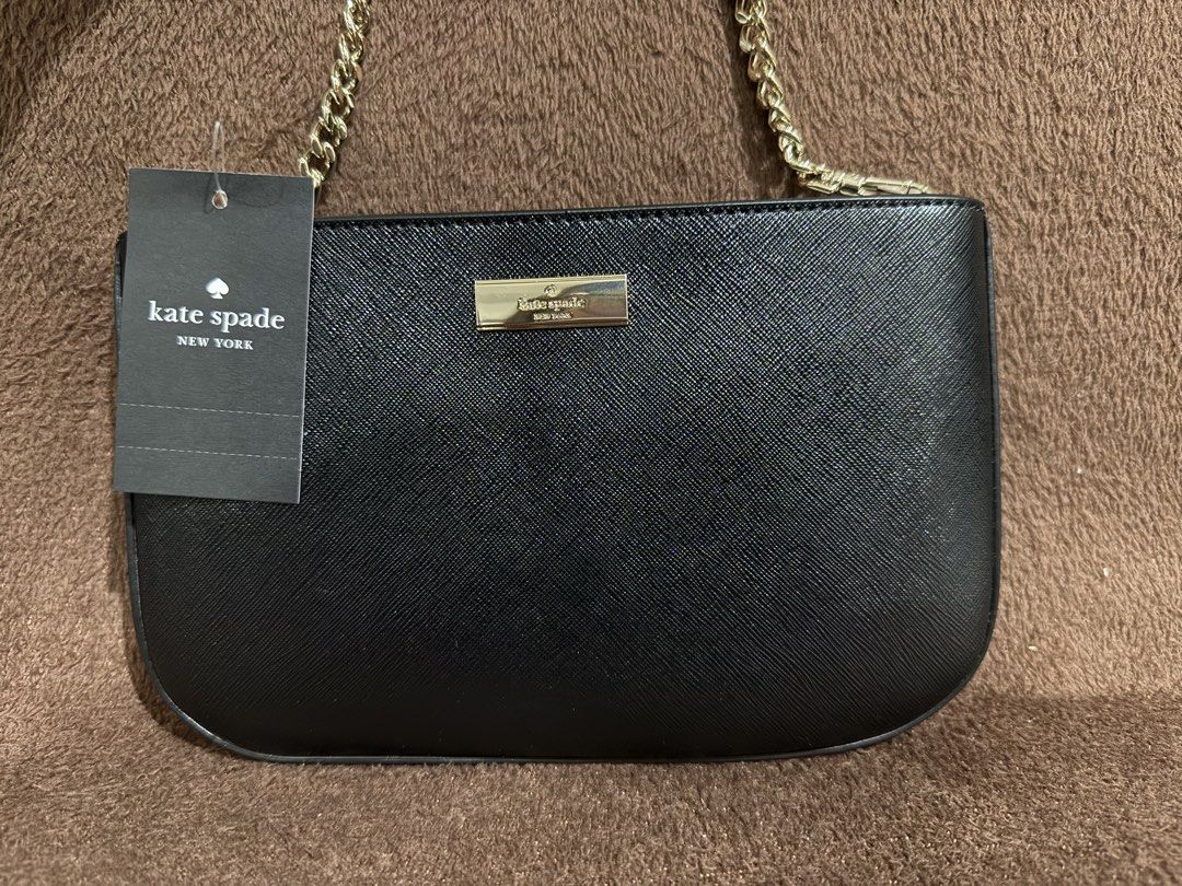 Authentic Kate Spade Kenzie Lilly Pochette (Category: Shoulder Bags) located in Quezon City. Submitted by andanel16 (Listing ID 1425927887, Image 1). Description: Authentic Kate Spade Kenzie Lilly Pochette Condition: Brand New Price: ₱ 5,000 • Elegant and versatile • Perfect for everyday errands or casual outings • Fits phone, cards, cash, and small essentials 100% Original From US If sure buyer po, I can send actual photos + packing video for tr