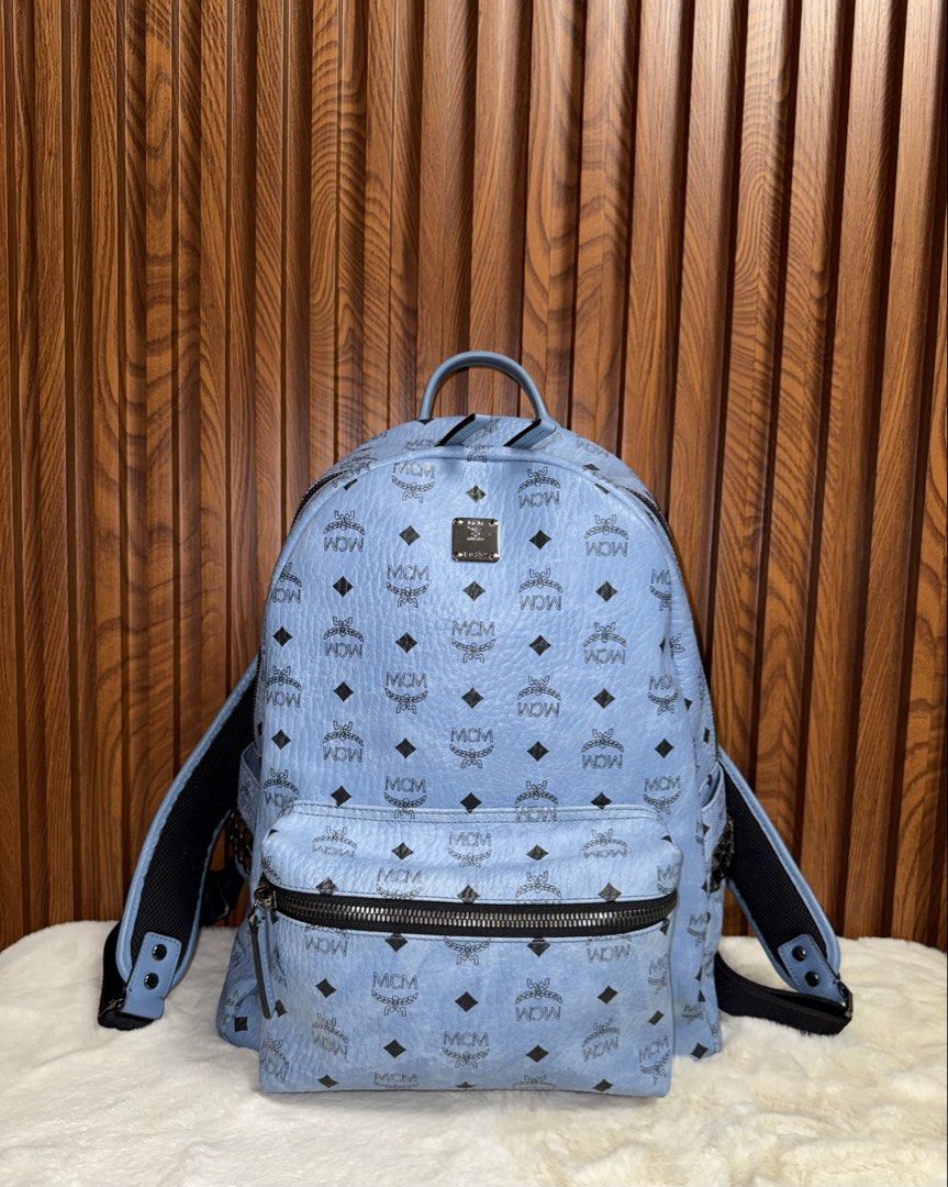 Authentic MCM Backpack (Category: Luxury Bags & Wallets) located in Subic. Submitted by luxshoppe88 (Listing ID 1425888010, Image 1). Description: Hey there! Check out this awesome MCM in blue color.The design is super stylish, perfect for everyday wear. The material feels really nice and durable. Grab it before someone else does! Still very jice bag actual.. roomy bag. Note: has normal signs of usage interior only (sort of peeling) as you can se