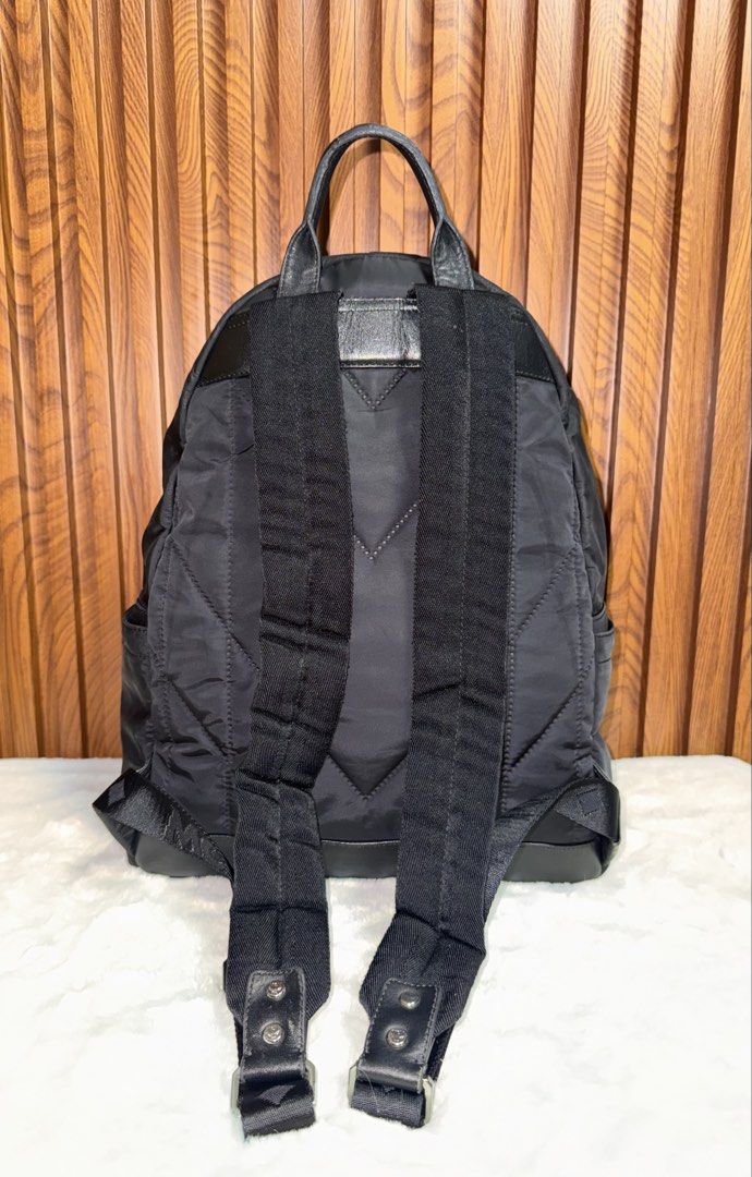 Authentic MCM nylon/leather monogram Backpack (Category: Luxury Bags & Wallets) located in Subic. Submitted by luxshoppe88 (Listing ID 1425888859, Image 3). Description: Hey there! Check out this awesome MCM nylon monogram backpack in a sleek black color. The design is super stylish, perfect for everyday wear. The material feels really nice and durable. Grab it before someone else does! Still in excellent used condition. Very nice bag actual. Spa