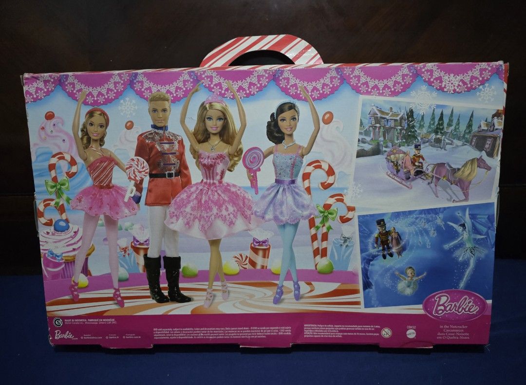 Barbie in the Nutcracker 4-Doll Holiday Gift Set (Category: Kids Toys) located in Pasig City. Submitted by temerity_16 (Listing ID 1425947448, Image 2). Description: NRFB 2014 Barbie in the Nutcracker 4-Doll Holiday Gift Set Doll heads are still attached to the cardboard Complete Accesories Includes two extra dresses🥻👗 1 bag👜 2 extra pair of shoes 👡👡🥿🥿 2 lollipops 🍭 🍭 NRFB.