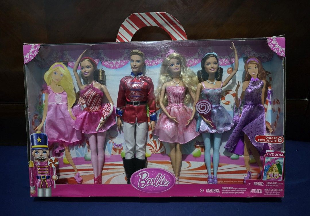 Barbie in the Nutcracker 4-Doll Holiday Gift Set (Category: Kids Toys) located in Pasig City. Submitted by temerity_16 (Listing ID 1425947448, Image 1). Description: NRFB 2014 Barbie in the Nutcracker 4-Doll Holiday Gift Set Doll heads are still attached to the cardboard Complete Accesories Includes two extra dresses🥻👗 1 bag👜 2 extra pair of shoes 👡👡🥿🥿 2 lollipops 🍭 🍭 NRFB.